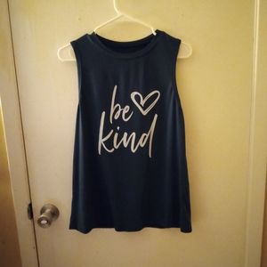 Blue tank top with the words "BE KIND"